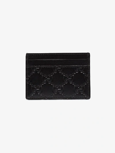 Shop Gucci Black Embossed Gg Leather Card Holder