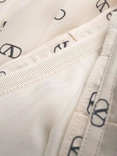 Shop Valentino Vlogo Pleated Skirt - Neutrals