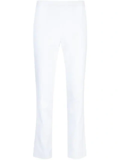 Shop Josie Natori Slim Fit Jeans In White