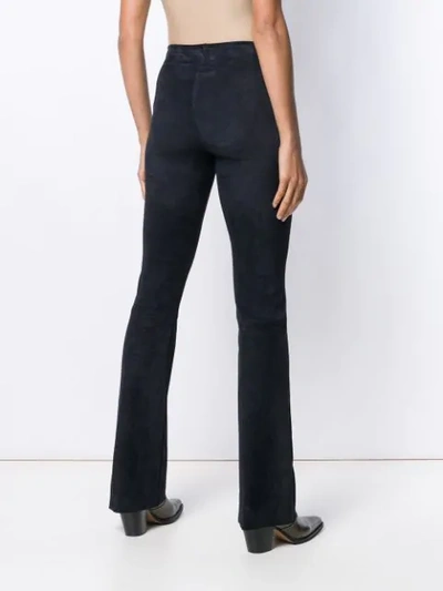 Shop Drome Bootleg Trousers In Blue