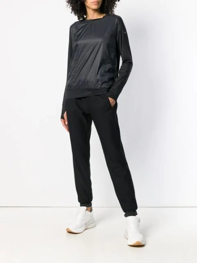 Shop Nike Running Jacket Pullover In Black