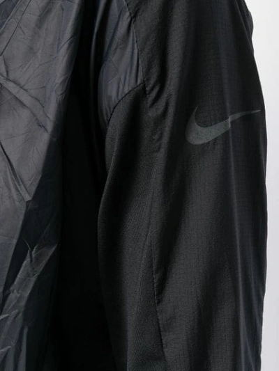 Shop Nike Running Jacket Pullover In Black