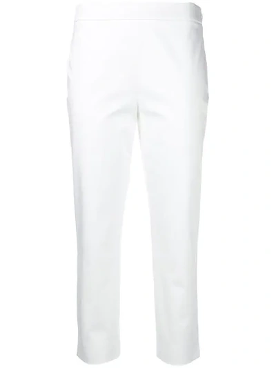Shop Moschino Cropped Tailored Trousers In White