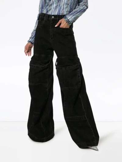 Shop Y/project Cargo Pocket Flared Jeans In Black
