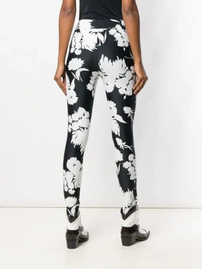 Shop Ganni Skinny Fit Floral Trousers In Black