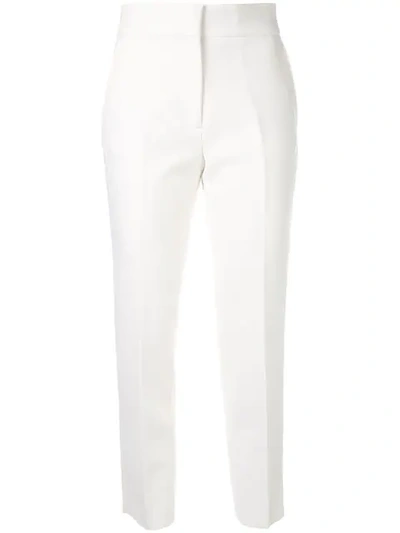 Shop Msgm Slim Cropped Trousers In White