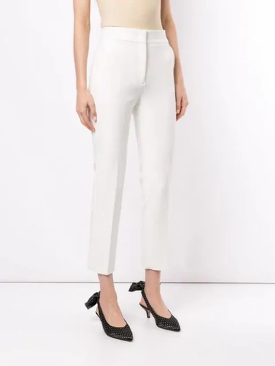 Shop Msgm Slim Cropped Trousers In White