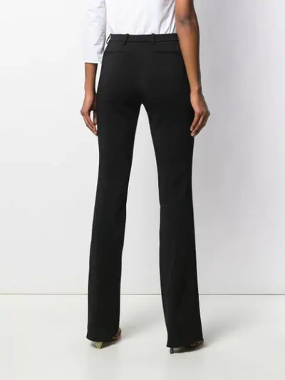 Shop Roberto Cavalli Bootcut Tailored Trousers - Black
