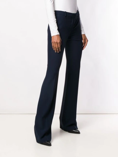 Shop Alexander Mcqueen Bootcut Trousers In Blue