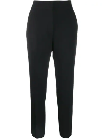 Shop Msgm Cropped Slim-fit Trousers In Black