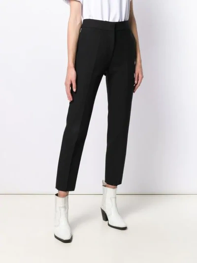 Shop Msgm Cropped Slim-fit Trousers In Black