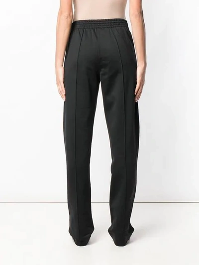 Shop Givenchy Straight Jersey Trousers In Black