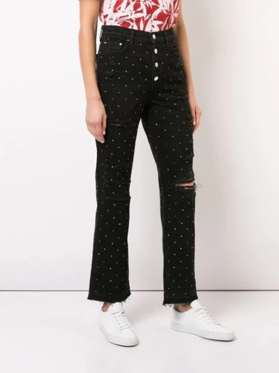 Shop Amiri Crystal Studded Ripped Jeans In Black