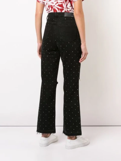 Shop Amiri Crystal Studded Ripped Jeans In Black