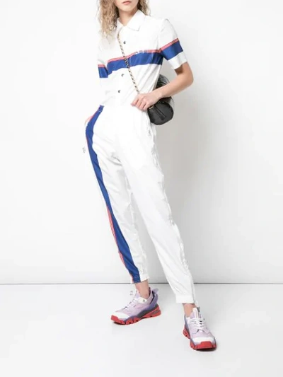 Shop Adam Selman Sport Logo Stripe Track Pants In White