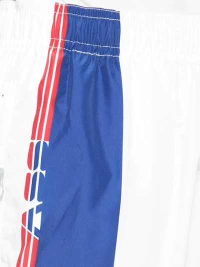 Shop Adam Selman Sport Logo Stripe Track Pants In White