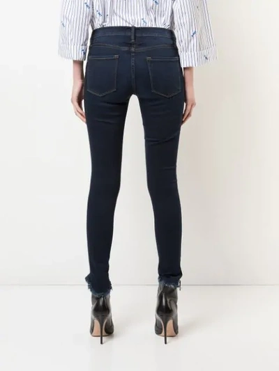 Shop Frame Le Skinny De Jeanne Jeans In Blue