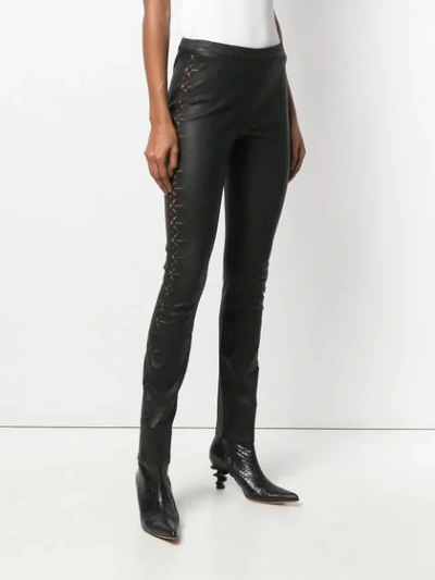 Shop Haider Ackermann Laser Cut Detail Trousers In 099 Black