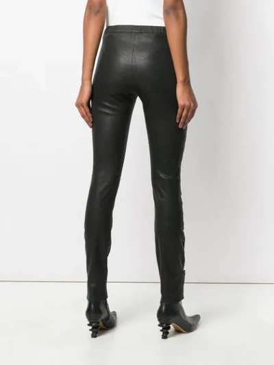Shop Haider Ackermann Laser Cut Detail Trousers In 099 Black