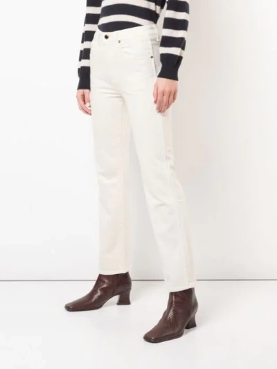 Shop Khaite Straight Leg Jeans In Neutrals