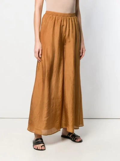 Shop Mes Demoiselles Elasticated Palazzo Trousers In Brown