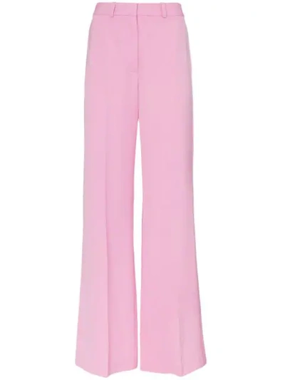 Shop Stella Mccartney Slit Hem Tailored Wool Trousers In 5860 Pink