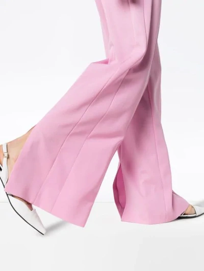 Shop Stella Mccartney Slit Hem Tailored Wool Trousers In 5860 Pink