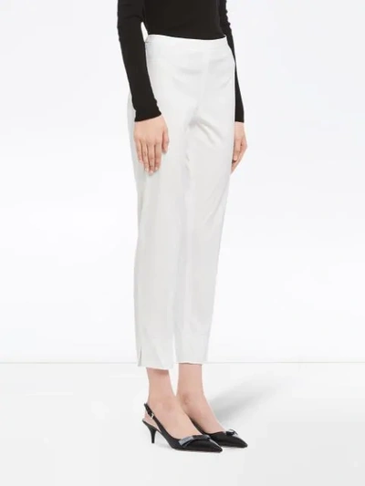 Shop Prada Slim-fit Trousers In White