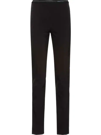 Shop Prada Technical Fabric Trousers In Black