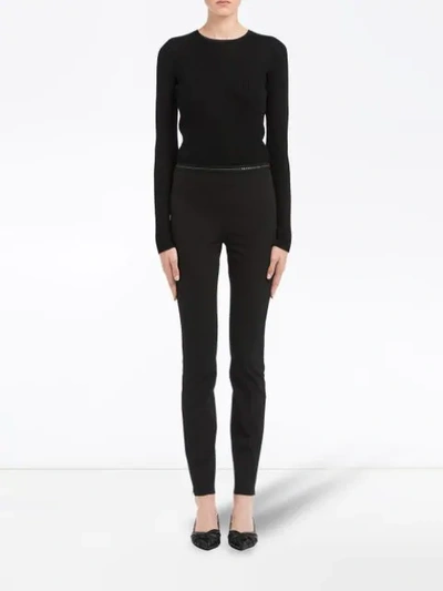 Shop Prada Technical Fabric Trousers In Black