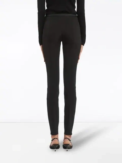 Shop Prada Technical Fabric Trousers In Black