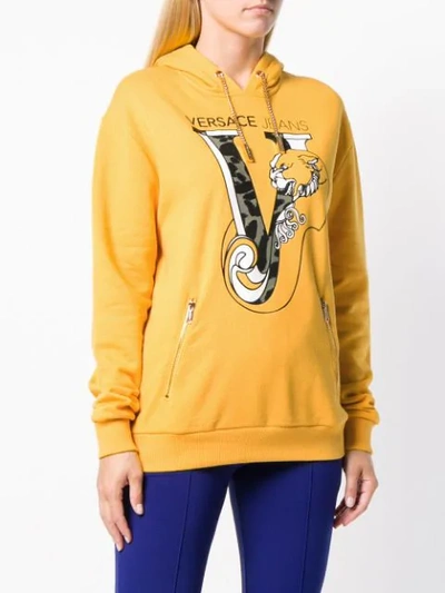 Shop Versace Jeans Printed Logo Pullover Hoodie In Yellow