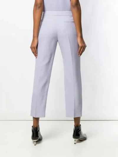 Shop Alexander Mcqueen Tapered Trousers In Purple