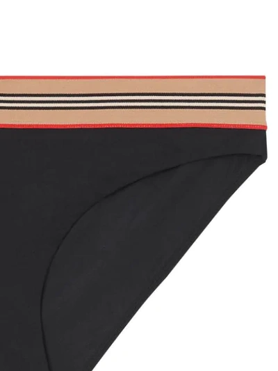 Shop Burberry Icon Stripe Detail Bikini In Black