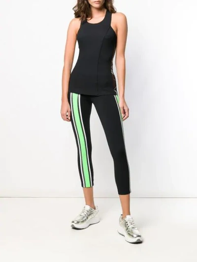 Shop No Ka'oi Striped Cropped Leggings In Black