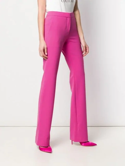 Shop Moschino Wide Leg Trousers In Pink