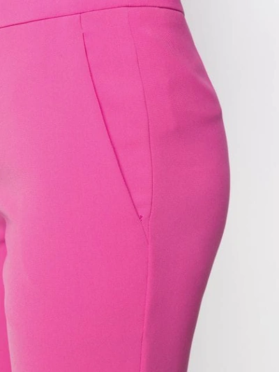 Shop Moschino Wide Leg Trousers In Pink