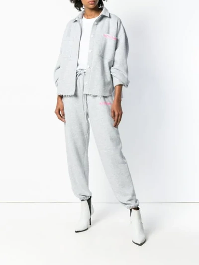 Shop Natasha Zinko Logo Print Track Pants In Grey