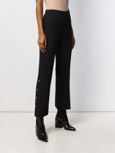 Shop Prada Flared Trousers In 002 Nero