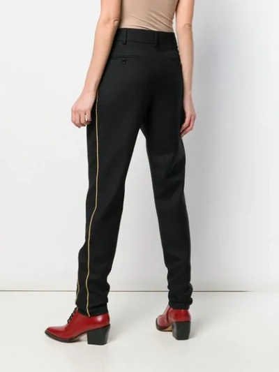 Shop Saint Laurent Lurex Trim Trousers In Black