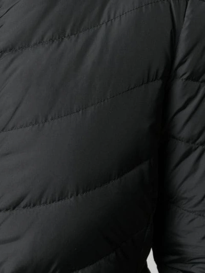 Shop Moncler Taillierte Daunenjacke In Black