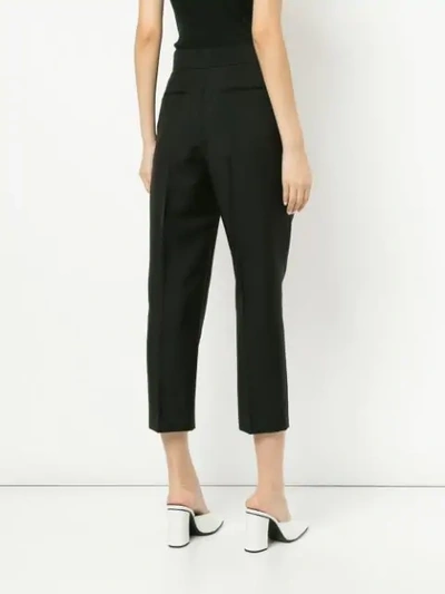 creased cropped trousers