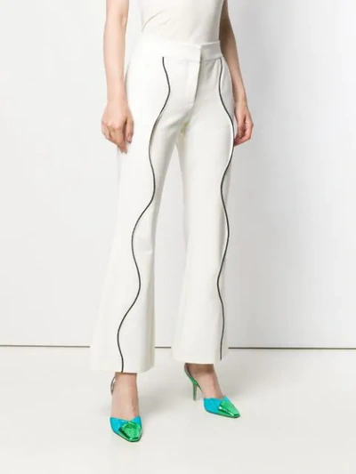 Shop Genny Contrasting Trim Flared Trousers - White