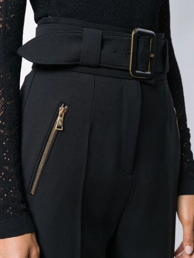 Shop Roberto Cavalli Belted High Waist Trousers In Black