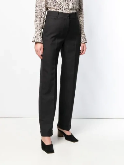 Shop Jacquemus Pleated Trousers In Black