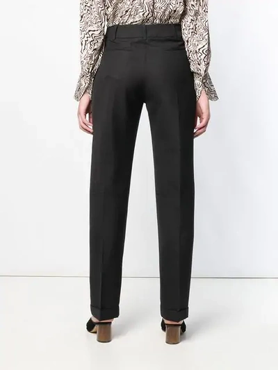Shop Jacquemus Pleated Trousers In Black
