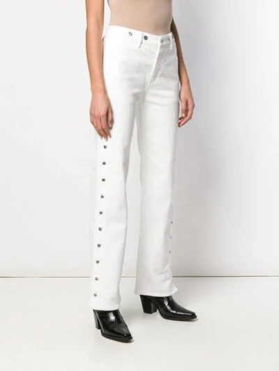 Shop Levi's Union Jeans In White