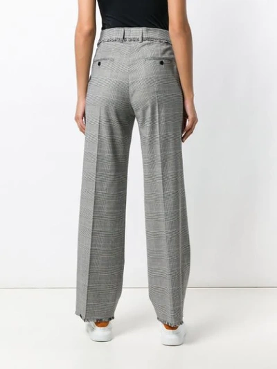 Shop Msgm Plaid Flared Tailored Trousers In Black
