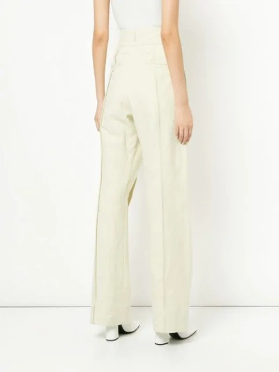 Shop Lemaire Buckle High Waisted Trousers In Neutrals