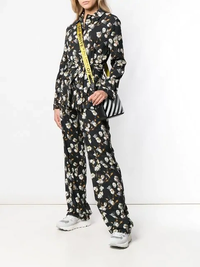 Shop Off-white Cotton Flower Print Trousers In Black